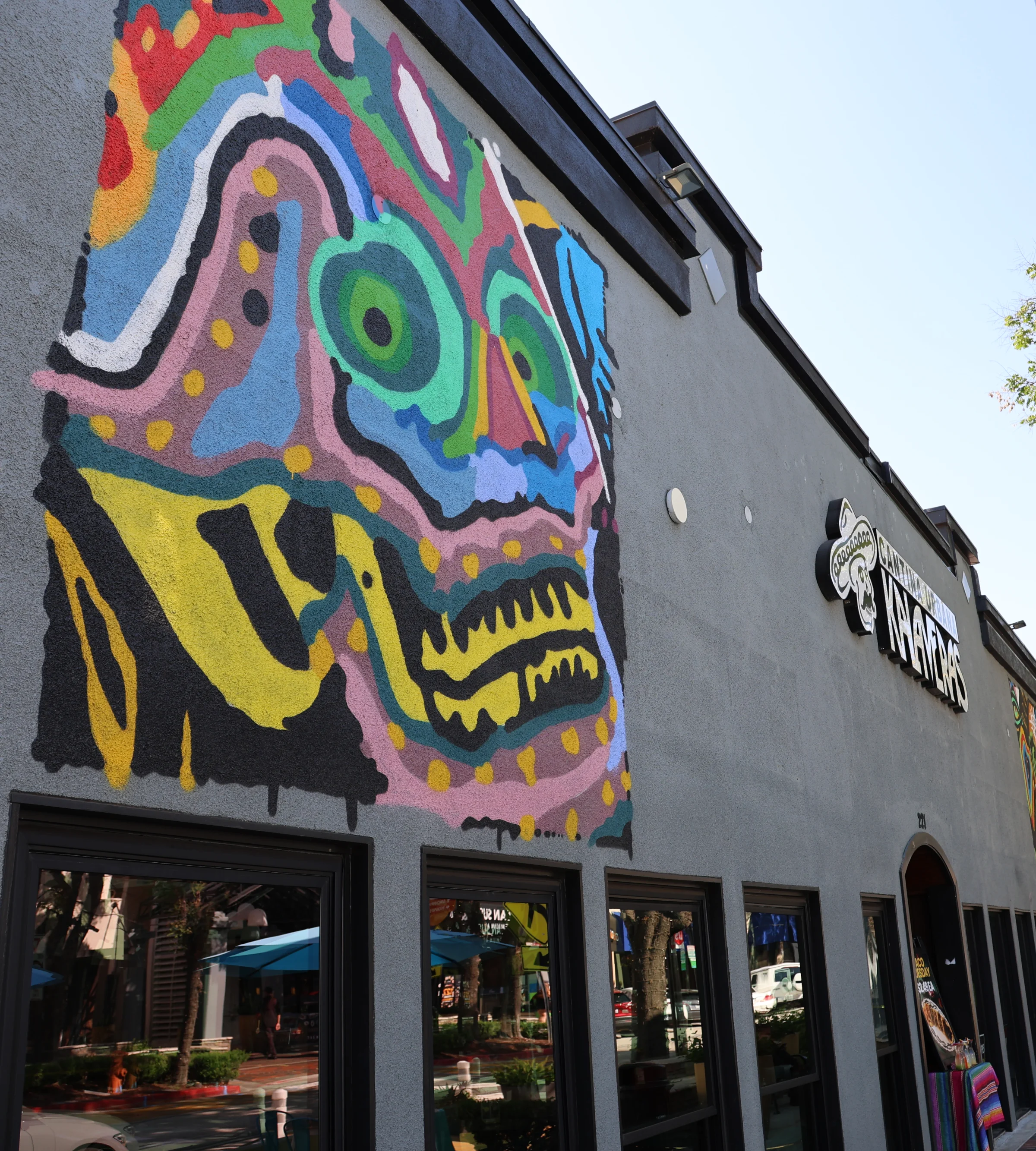 Colorful skull mural on the side of Kalaveras